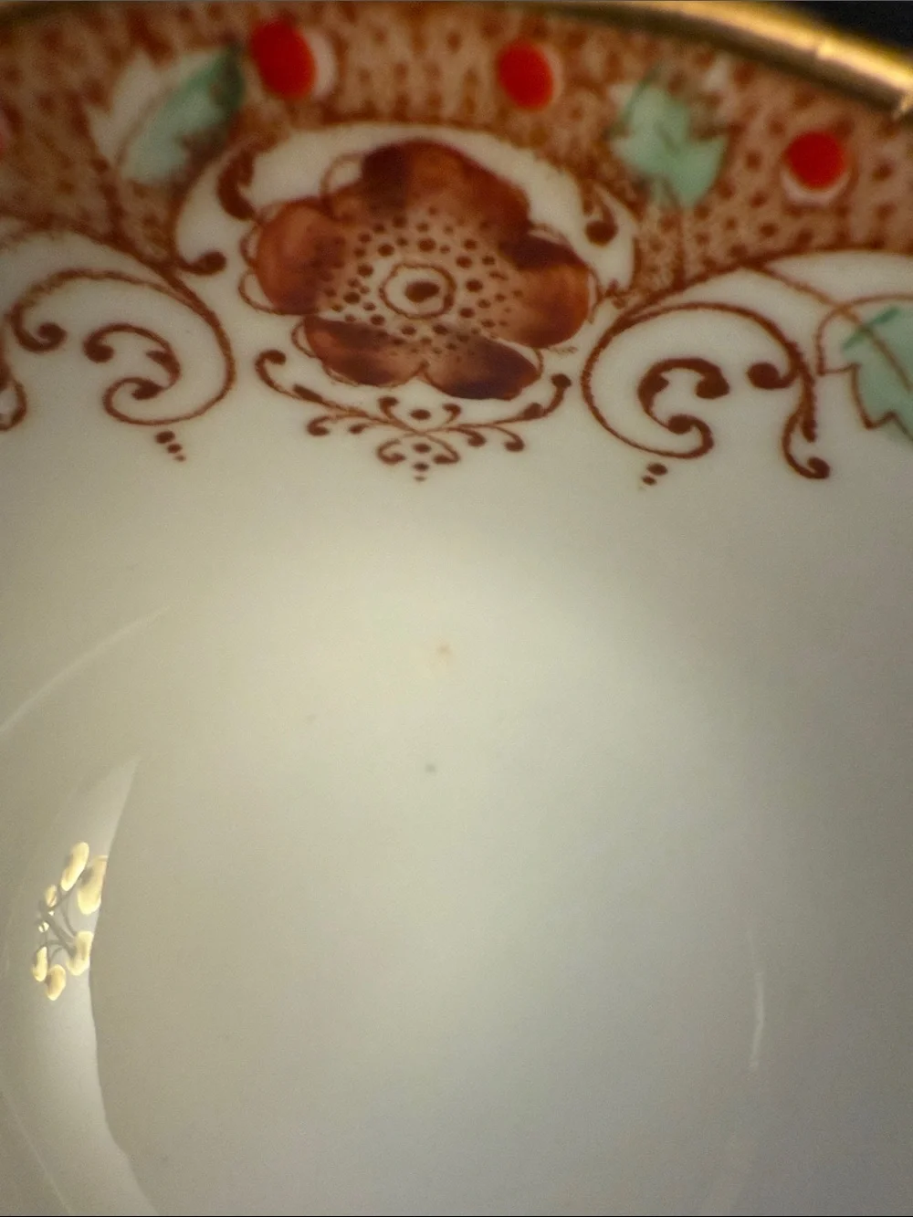 Decorative White and Navy Porcelain Tea Cup with Gold Accents